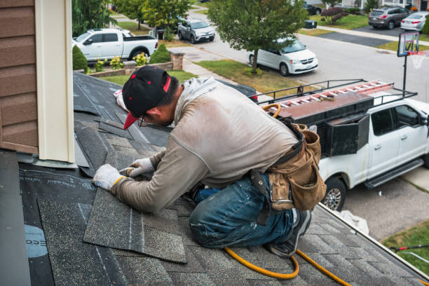 Professional Roof Replacement technician working in Bandon, OR